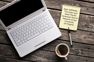 Image of laptop, notepad, and cup of coffee