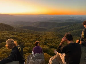 Photo of actives looking out from the summit of Humpback Rock