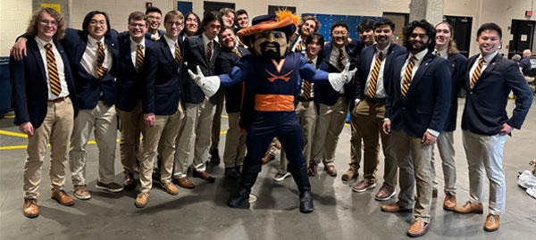 Glee Club members with UVA's Cav Man