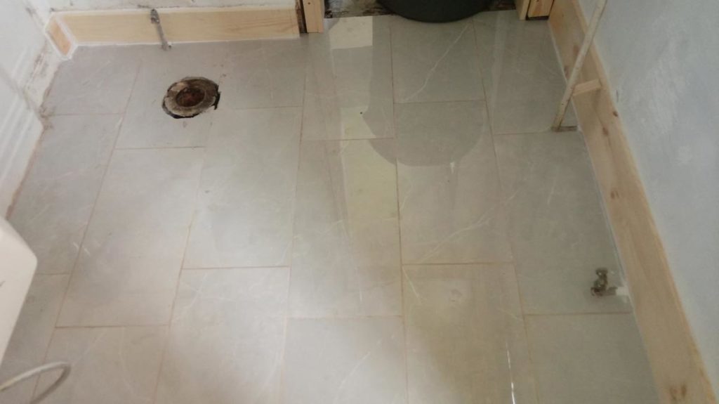 Retiled tube room bathroom