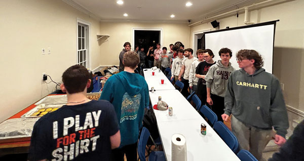 Image of brothers lining up for Sunday Night Dinner