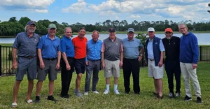 Picture of 1970s Phi alumni at a golf course in Florida.