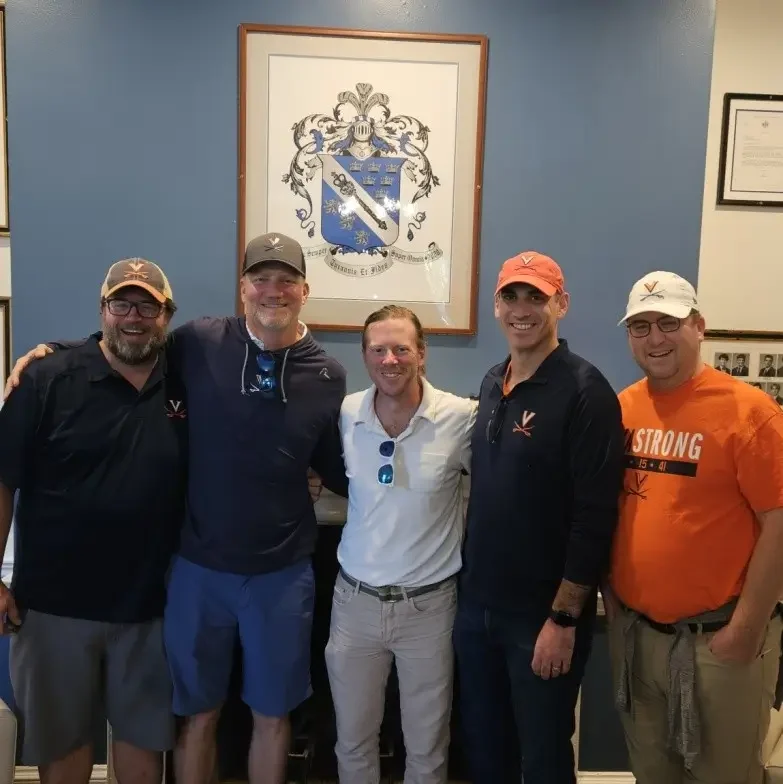 Pete Broadbent, Brent Sacha, Carter Griffith, Jason Rothman, and Andrew McAllister in a photo taken inside One University Circle