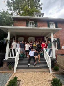 Actives all gathered on the porch of the chapter house