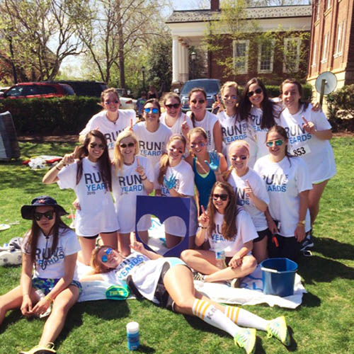 Delta Chis gather for a photo after pledging to be one for change.