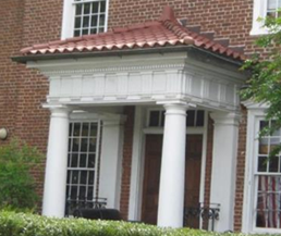 Side portico in need of repair 