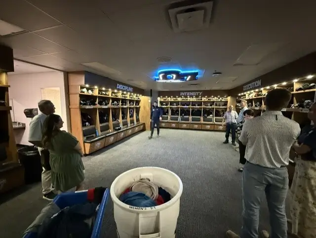 Photo of attendees in the locker room