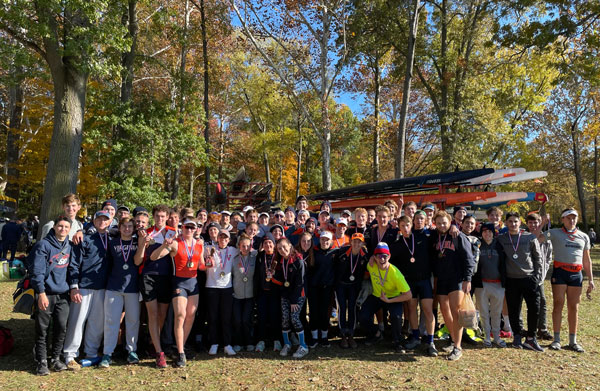 Group photo of team with medals following the Bald Eagle Invitational
