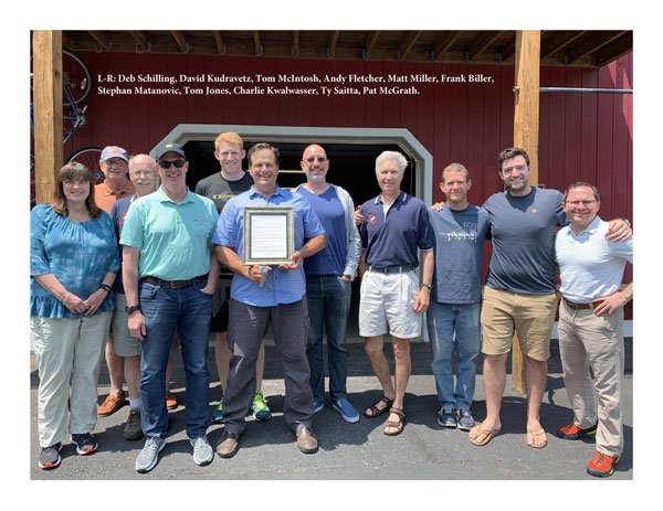 Frank Biller, Rowing Coach, receiving plaque from VRA board