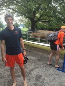 Ian Feeney '14 with cows
